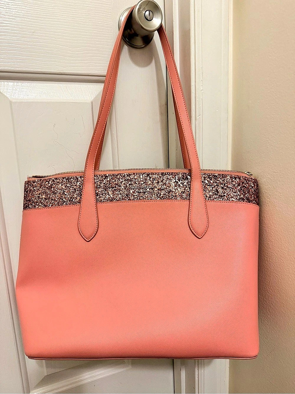 Authentic Kate Spade tote in a gorgeous blush pink with rose glitter accents